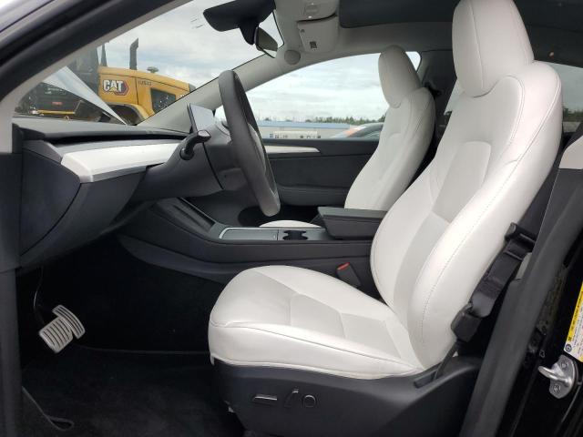 Photo 7 from auction – 2023 TESLA MODEL Y with VIN 7SAYGDEF2PF874674