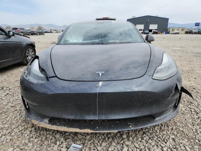 Photo 5 from auction – 2021 TESLA MODEL 3 with VIN 5YJ3E1EC9MF033979