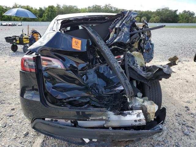 Photo 6 from auction – 2023 TESLA MODEL Y with VIN 7SAYGDEE0PA077103