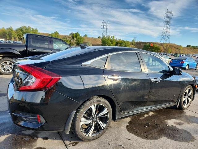 Photo 3 from auction – 2018 HONDA CIVIC TOUR with VIN 2HGFC1F96JH642203