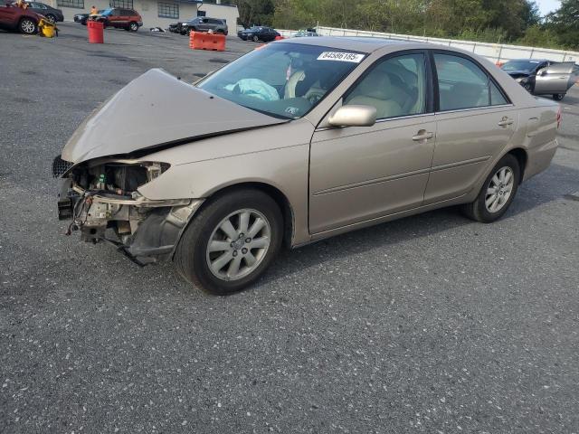 TOYOTA CAMRY LE 2002 with VIN 4T1BF30KX2U023206 - Photo from auction