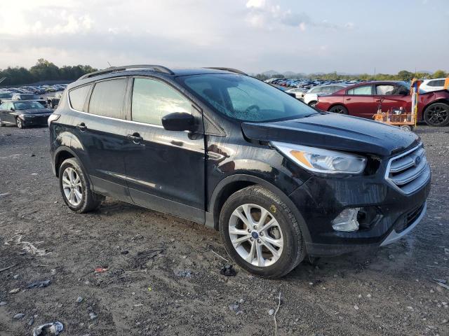 Photo 4 from auction – 2018 FORD ESCAPE SE with VIN 1FMCU0GD4JUD39151
