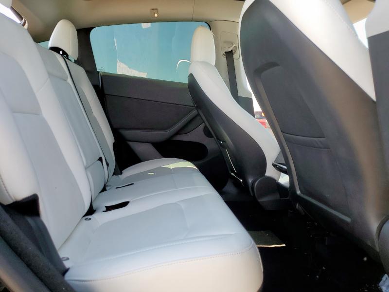 Photo 11 from auction – 2023 TESLA MODEL Y with VIN 7SAYGDEE0PF631534