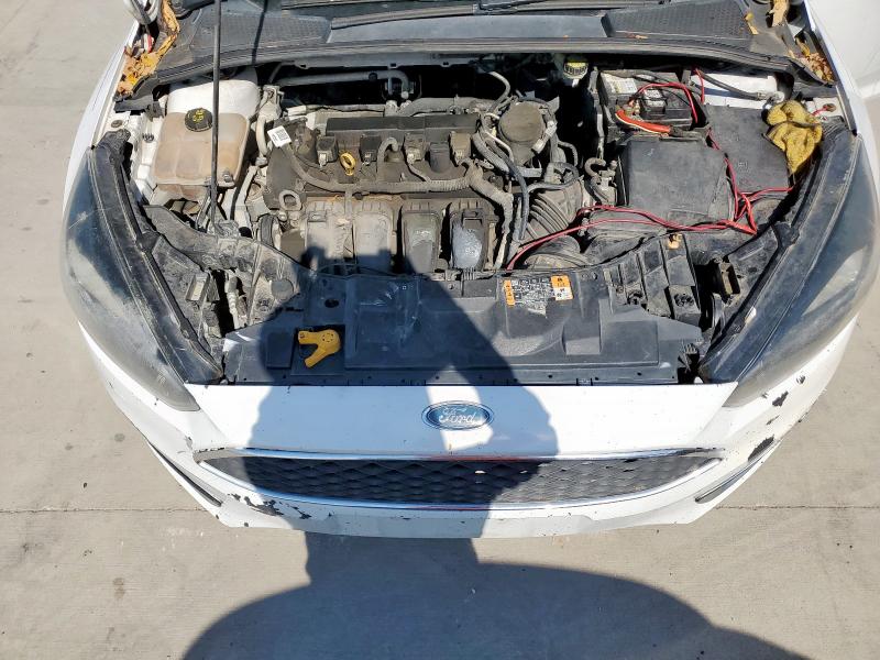 Photo 11 from auction – 2015 FORD FOCUS SE with VIN 1FADP3F25FL311556