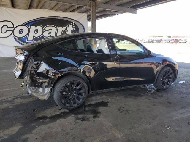 Photo 3 from auction – 2022 TESLA MODEL Y with VIN 7SAYGDEE3NF554235