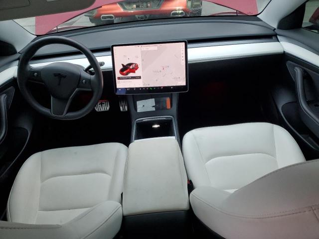 Photo 8 from auction – 2021 TESLA MODEL 3 with VIN 5YJ3E1EB4MF999423