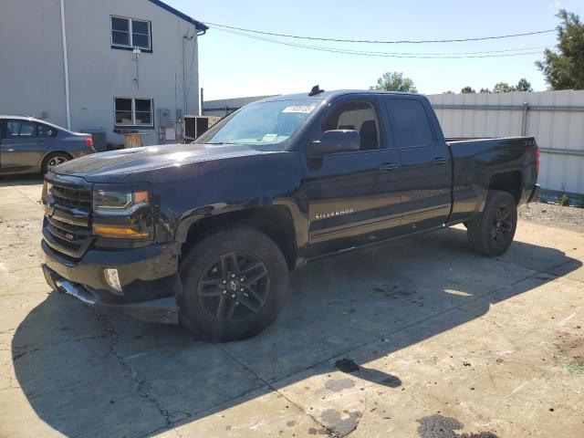 CHEVROLET SILVERADO 2018 with VIN 2GCVKREC2J1100761 - Photo from auction