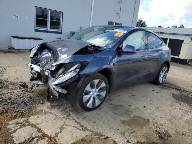 TESLA MODEL Y 2023 z numerem VIN 7SAYGDEE6PA194264 - Zdjęcie z aukcji