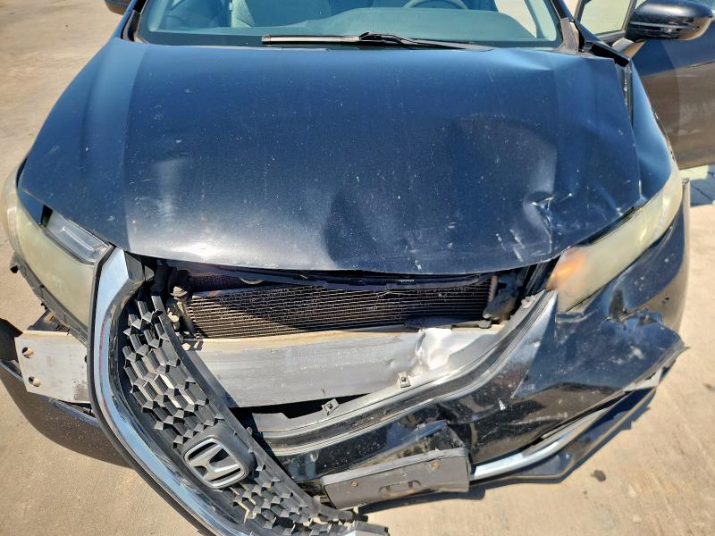 Photo 11 from auction – 2014 HONDA CIVIC LX with VIN 19XFB2F50EE062886