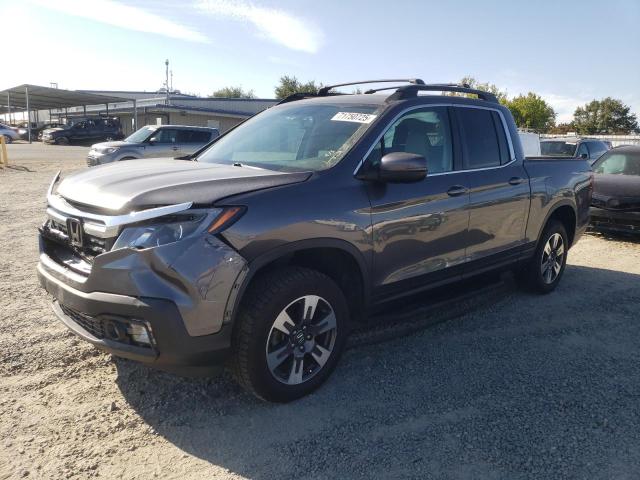 HONDA RIDGELINE 2017 with VIN 5FPYK3F65HB025815 - Photo from auction
