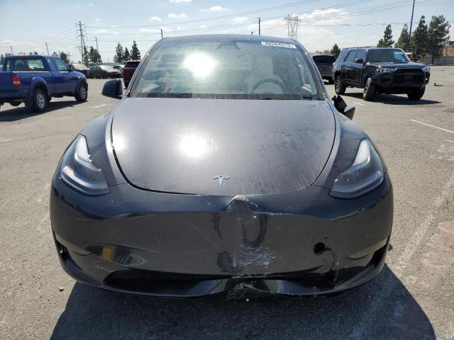 Photo 5 from auction – 2025 TESLA MODEL Y with VIN 7SAYGDED4SF230987