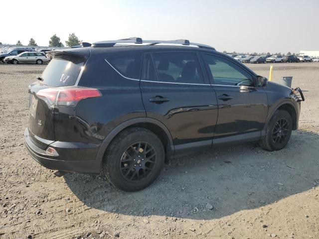 Photo 3 from auction – 2018 TOYOTA RAV4 LE with VIN 2T3BFREV9JW722676