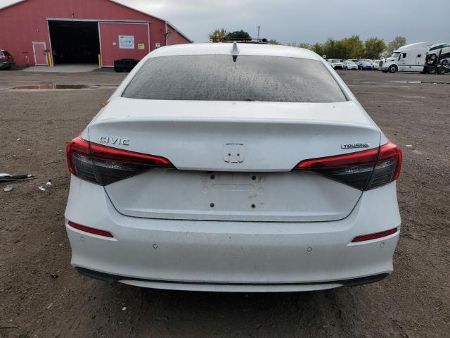 Photo 6 from auction – 2022 HONDA CIVIC TOUR with VIN 2HGFE1F97NH002002