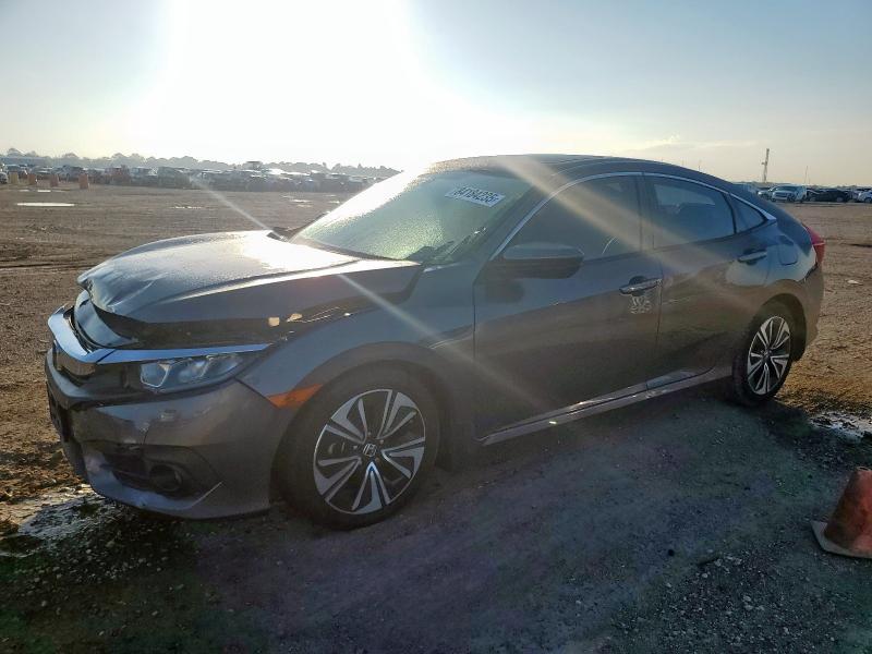 HONDA CIVIC EXL 2017 with VIN 19XFC1F72HE011743 - Photo from auction
