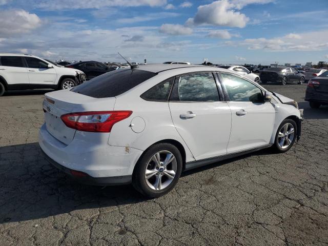 Photo 3 from auction – 2014 FORD FOCUS SE with VIN 1FADP3F24EL312051