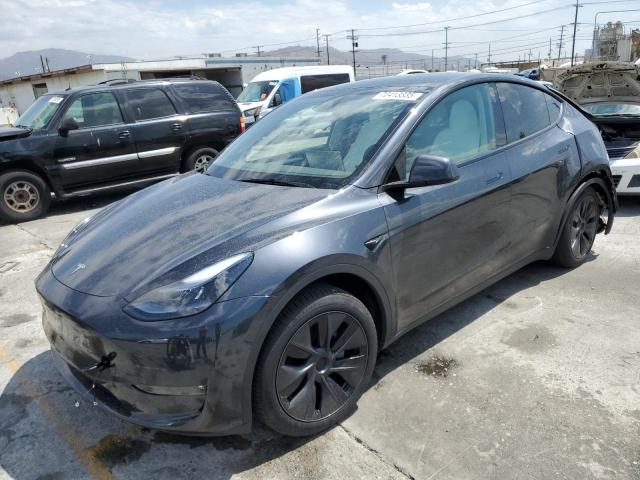 TESLA MODEL Y 2025 with VIN 7SAYGAEE7SF305480 - Photo from auction