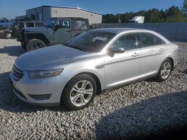 FORD TAURUS SEL 2014 with VIN 1FAHP2E85EG138436 - Photo from auction