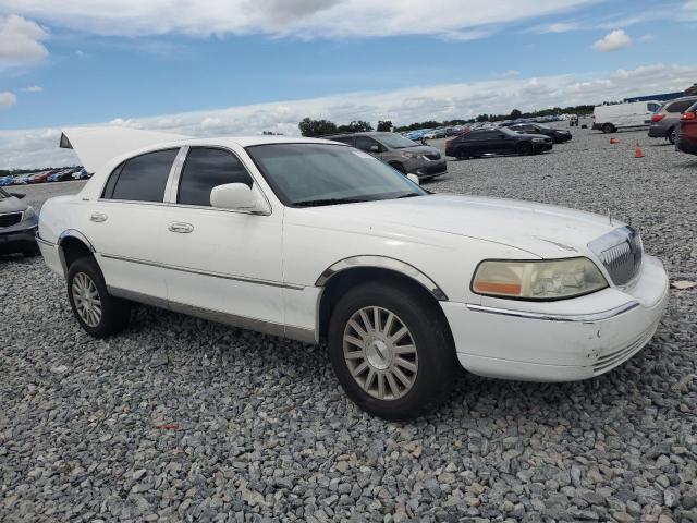 Photo 4 from auction – 2004 LINCOLN TOWN CAR E with VIN 1LNHM81W54Y611668