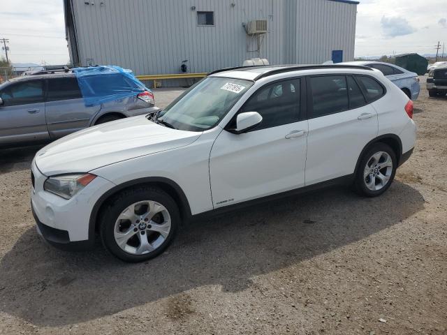 BMW X1 2014 with VIN WBAVM1C53EVW50973 - Photo from auction
