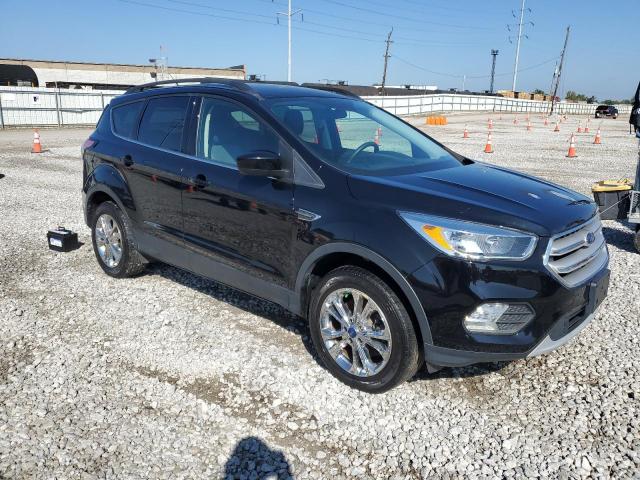 Photo 4 from auction – 2018 FORD ESCAPE SE with VIN 1FMCU9GD3JUB75864