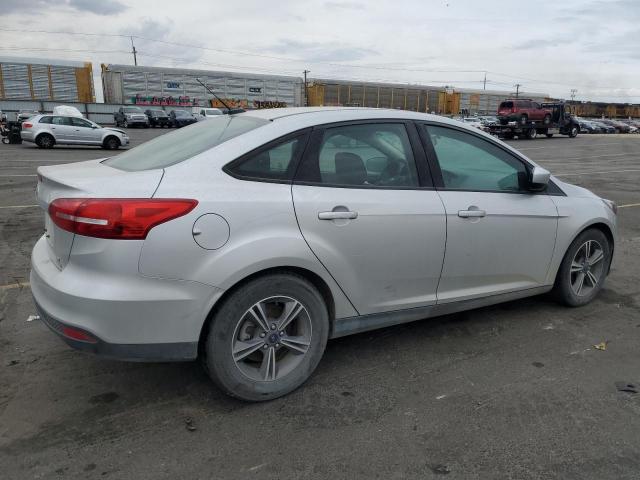 Foto 3 de la subasta – 2018 FORD FOCUS SE con VIN 1FADP3FE5JL278237