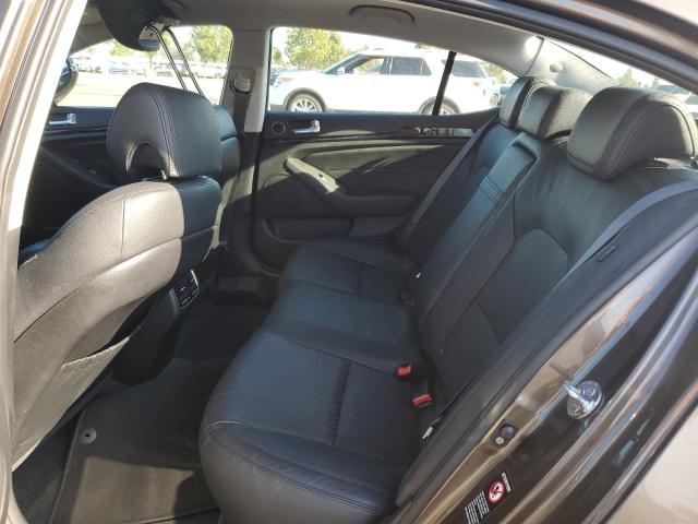 Photo 10 from auction – 2014 KIA CADENZA PR with VIN KNALN4D79E5126040