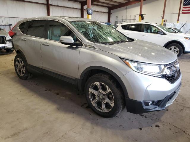 Photo 4 from auction – 2018 HONDA CR-V with VIN 2HKRW2H87JH628119