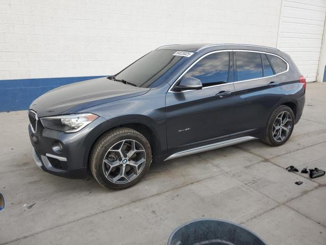 BMW X1 2018 with VIN WBXHT3C36J5K23913 - Photo from auction
