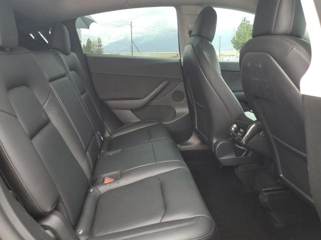Photo 11 from auction – 2022 TESLA MODEL Y with VIN 7SAYGDEF6NF409912