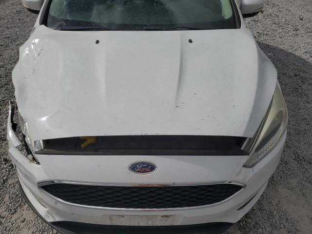 Photo 11 from auction – 2016 FORD FOCUS SE with VIN 1FADP3K28GL290211