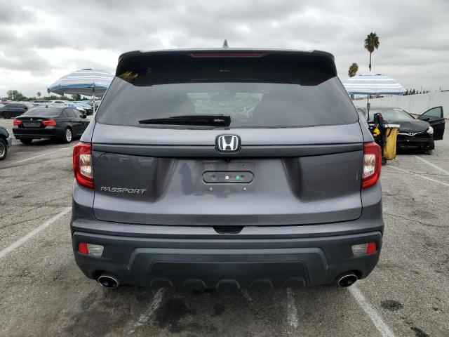 Photo 6 from auction – 2021 HONDA PASSPORT E with VIN 5FNYF7H51MB009937