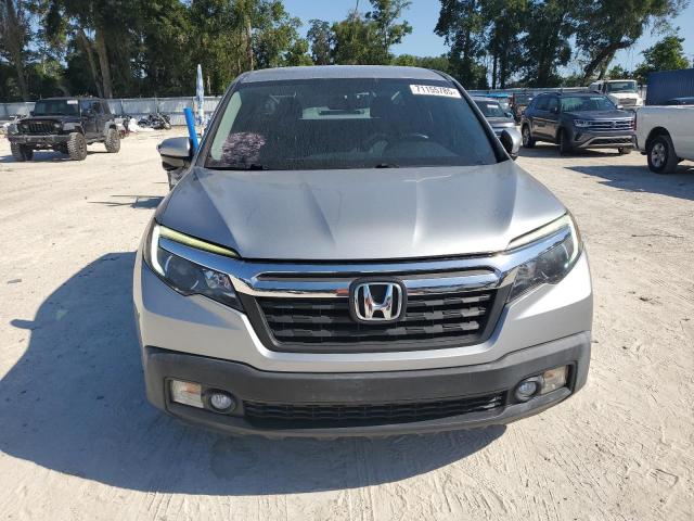 Photo 5 from auction – 2018 HONDA RIDGELINE with VIN 5FPYK2F64JB002946