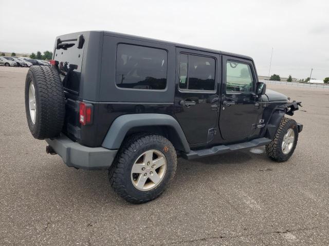 Photo 3 from auction – 2009 JEEP WRANGLER U with VIN 1J4GA39129L748697
