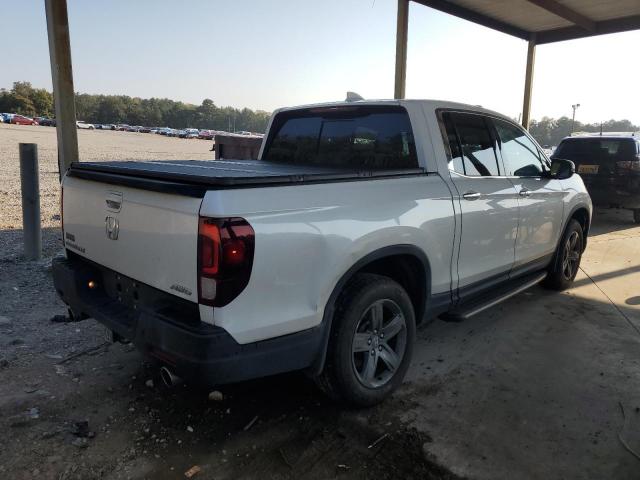 Photo 3 from auction – 2021 HONDA RIDGELINE with VIN 5FPYK3F72MB021207