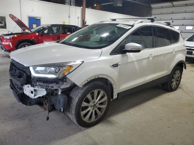 FORD ESCAPE TIT 2017 with VIN 1FMCU9J96HUC05437 - Photo from auction