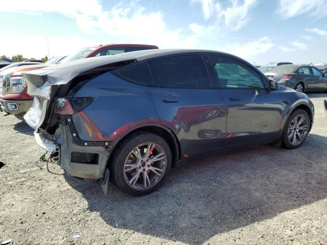 Photo 3 from auction – 2023 TESLA MODEL Y with VIN 7SAYGAEE7PF711251