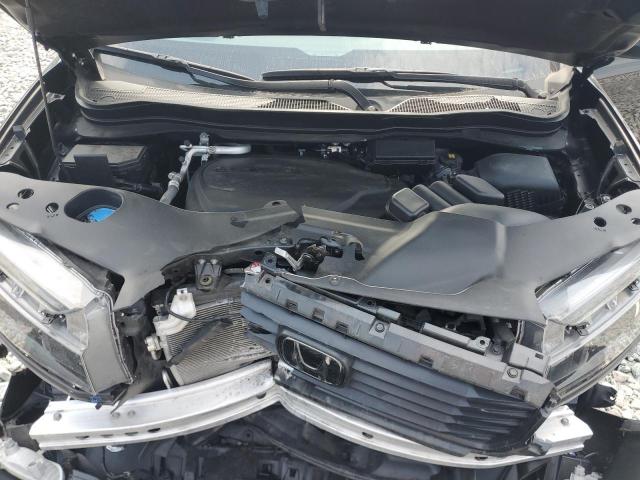 Photo 11 from auction – 2023 HONDA RIDGELINE with VIN 5FPYK3F50PB047646