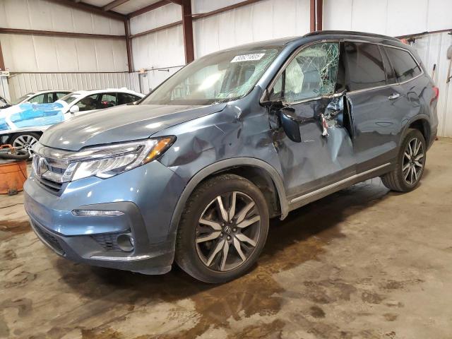 HONDA PILOT TOUR 2020 with VIN 5FNYF6H63LB010122 - Photo from auction