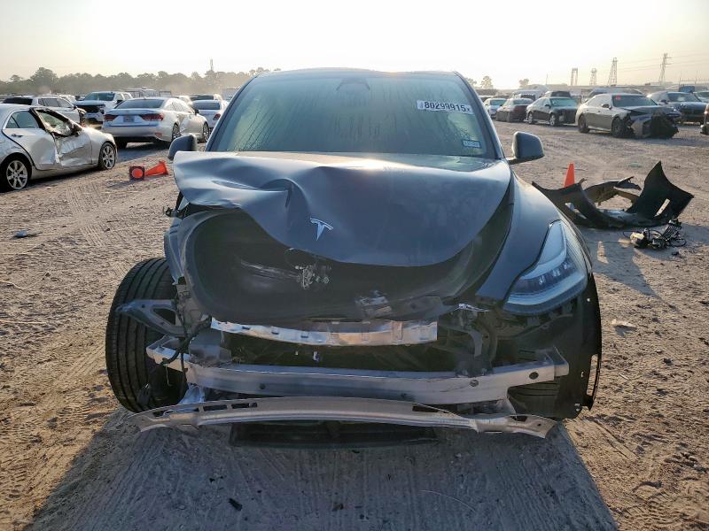 Photo 5 from auction – 2023 TESLA MODEL Y with VIN 7SAYGDEE3PA052180