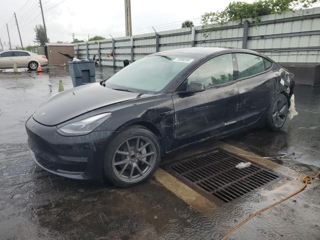 TESLA MODEL 3 2023 with VIN 5YJ3E1EA3PF385877 - Photo from auction