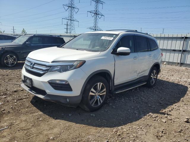 HONDA PILOT EXL 2016 with VIN 5FNYF6H55GB010281 - Photo from auction