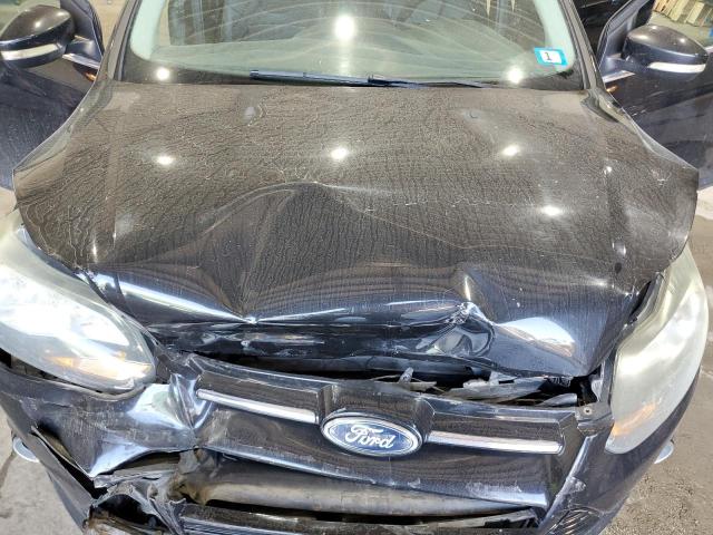Photo 11 from auction – 2014 FORD FOCUS TITANIUM with VIN 1FADP3N29EL445891