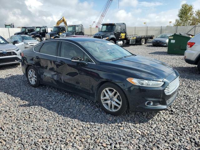Photo 4 from auction – 2014 FORD FUSION SE with VIN 3FA6P0HD7ER386846