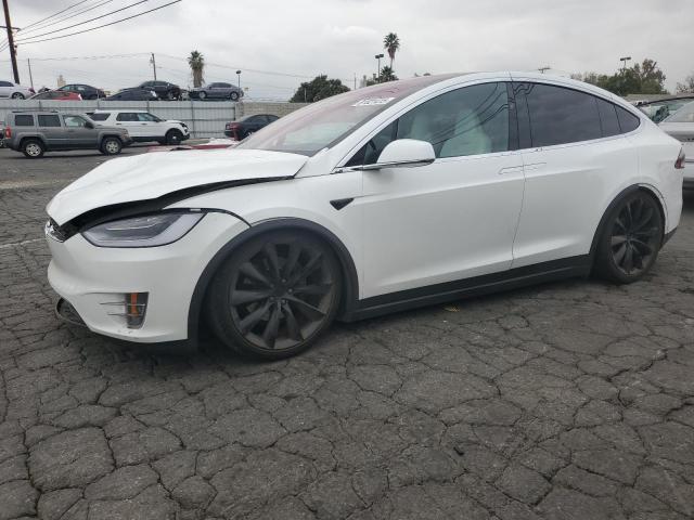 TESLA MODEL X 2019 with VIN 5YJXCBE2XKF214218 - Photo from auction