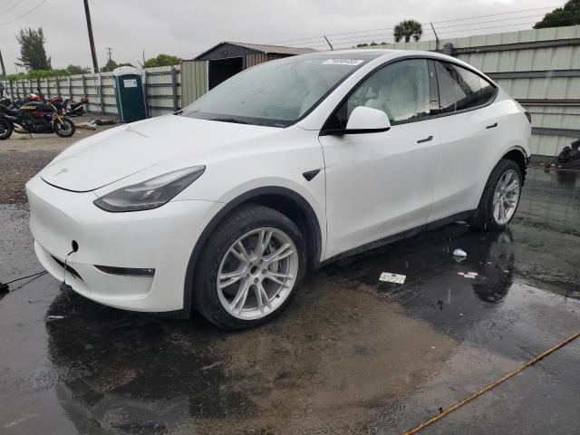 TESLA MODEL Y 2023 with VIN 7SAYGDED1PF962095 - Photo from auction