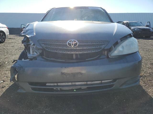 Photo 5 from auction – 2002 TOYOTA CAMRY with VIN 4T1BE32K12U555069