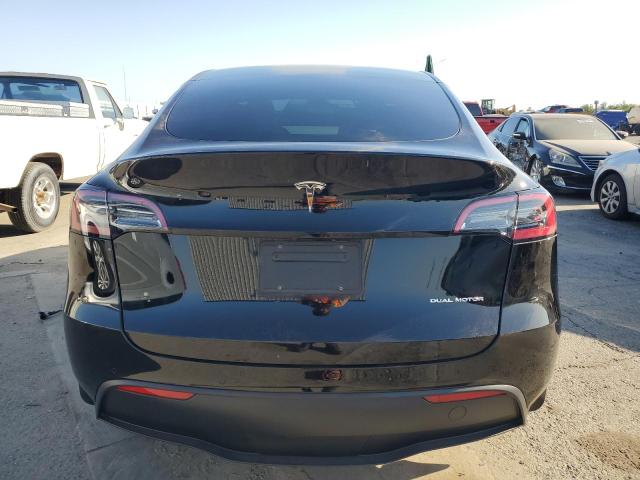 Photo 6 from auction – 2022 TESLA MODEL Y with VIN 7SAYGAEE2NF417561