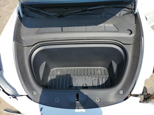 Photo 11 from auction – 2023 TESLA MODEL Y with VIN 7SAYGAEEXPF895200