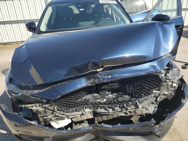 Photo 12 from auction – 2021 MAZDA CX-5 TOURING with VIN JM3KFBCM1M1499156