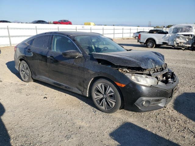 Photo 4 from auction – 2016 HONDA CIVIC with VIN 19XFC1F71GE213908